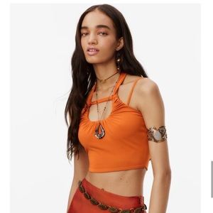 bright orange criss cross crop top!